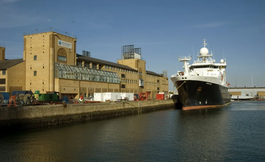 Waterfront Campus and the surrounding docks and boats on a sunny day.