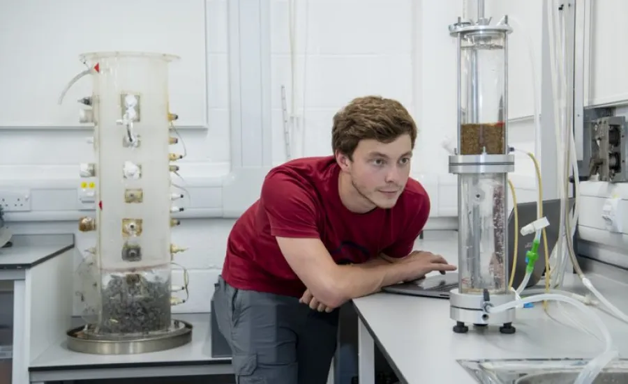 A student at work in the geomechanics laboratory