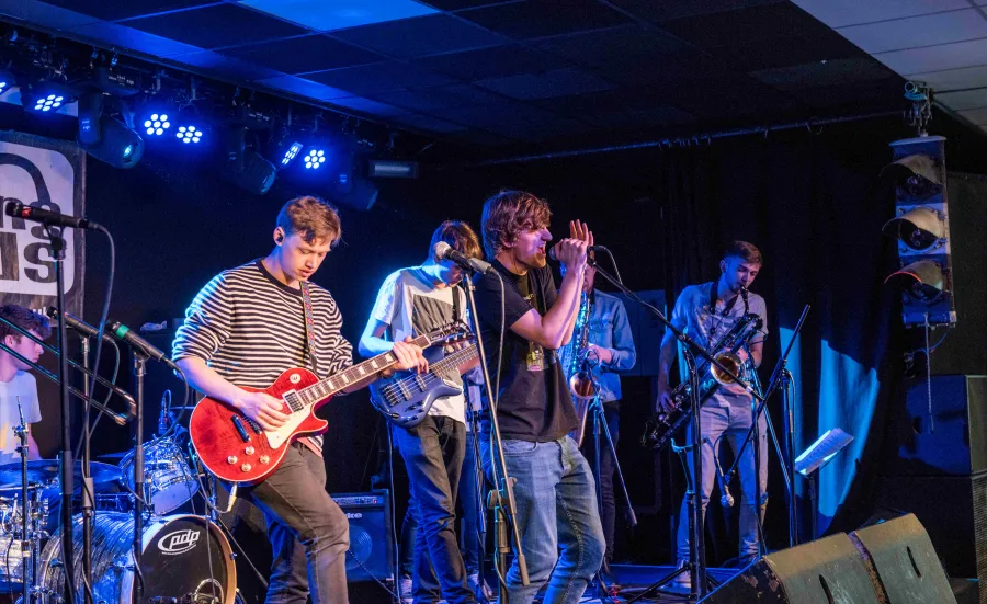 Music students performing in a band