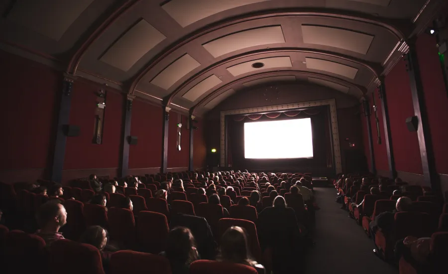 An audience watching a film