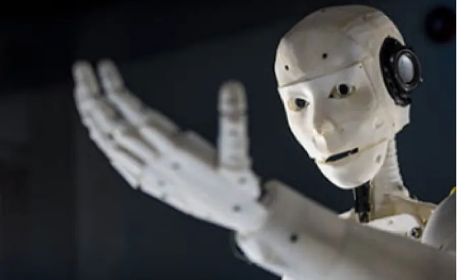 humanoid robot with arm outstretched