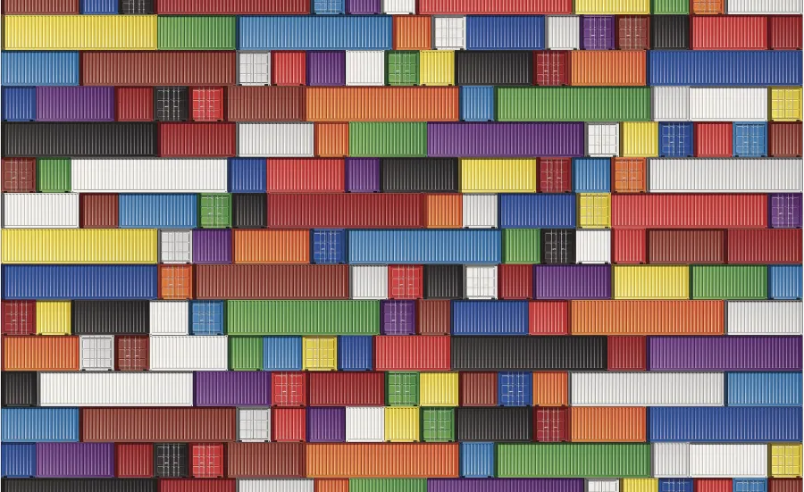 A colourful checkerboard of shipping containers viewed from a great height