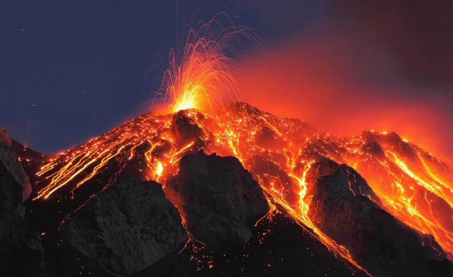 lava flowing down an erupting volcano