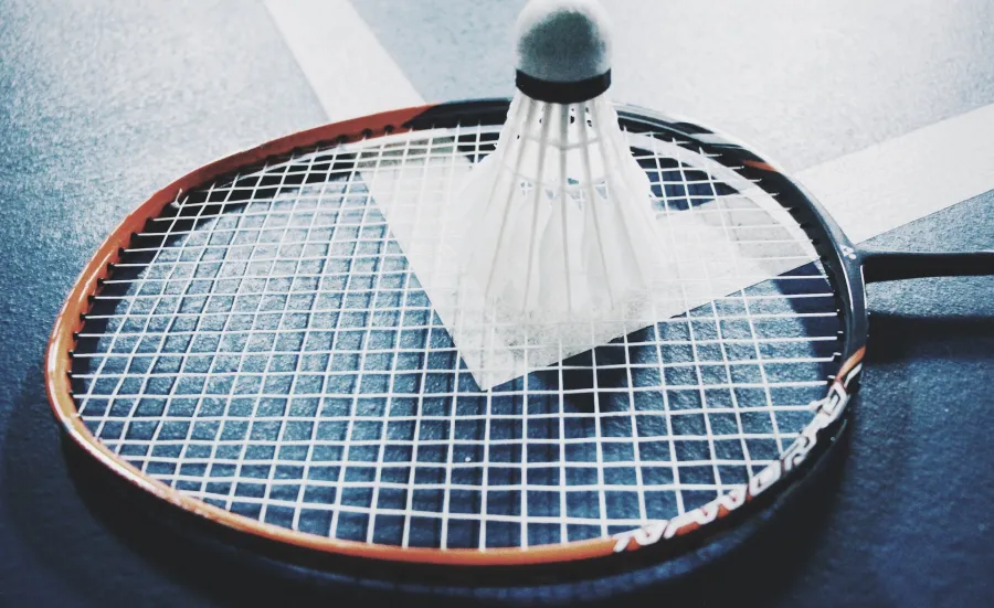 Close up of a badminton racket and shuttlecock