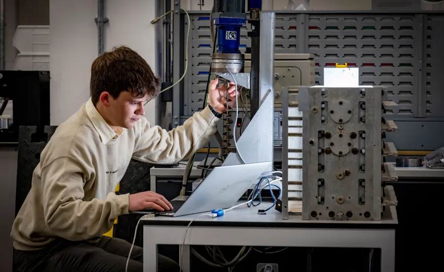 Timofey at work at a desk