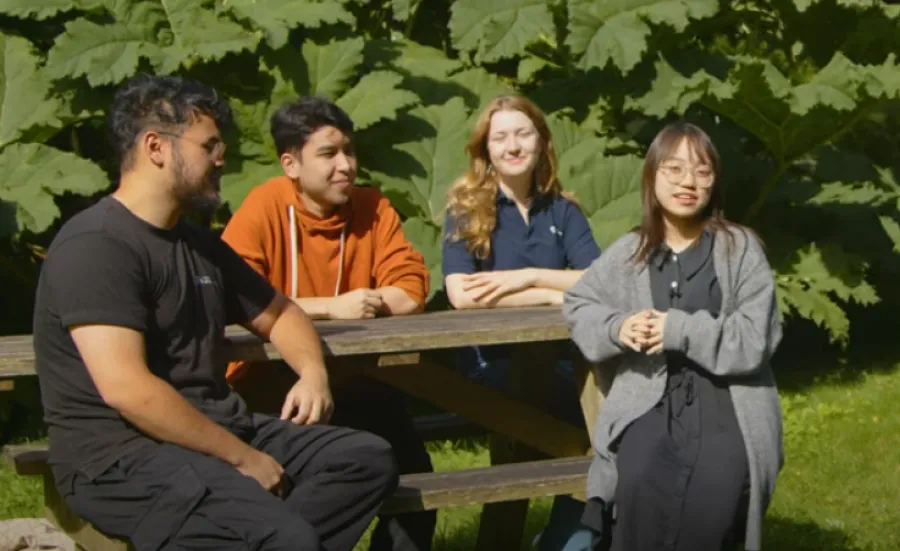 A group of students present GenAI top tips to camera from Valley Gardens on Highfield campus.