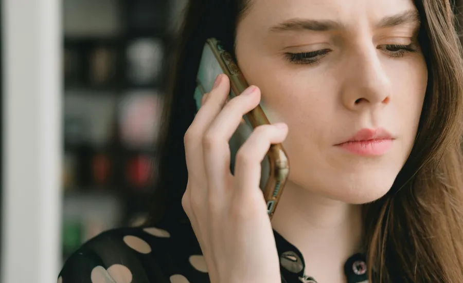 Young woman talking on her mobile phone