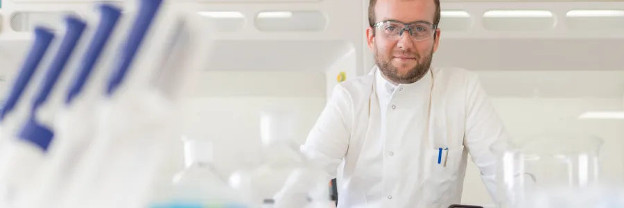 Scientist working with lab equipment