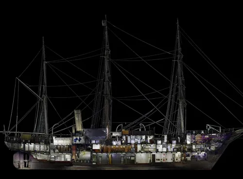 A digitally rendered cross-section of the RRS Discovery showing the different levels and holds of the ships interior