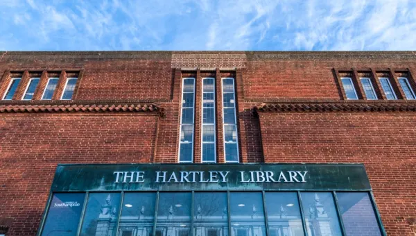 Frontage of the Hartley Library focusing on red brick detail and foyer windows