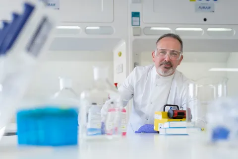 Scientist working with lab equipment