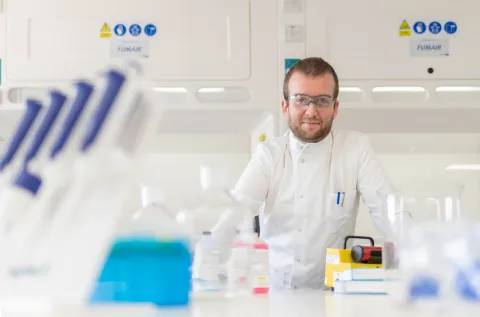 Scientist working with lab equipment