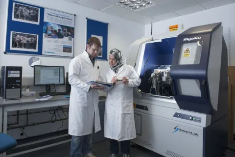 Researchers in the powder x-ray diffraction facility