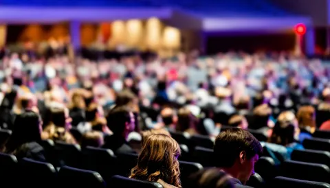 Audience Sitting in Chairs