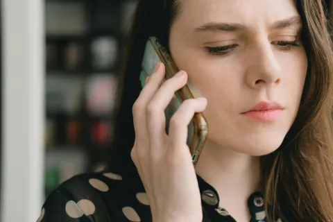 Young woman talking on her mobile phone