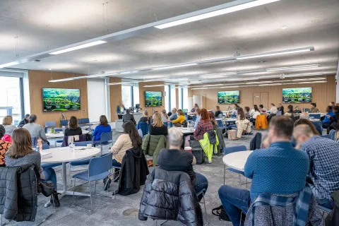 Group watching a presentation for an event