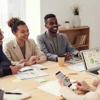 People sitting around a table and talking